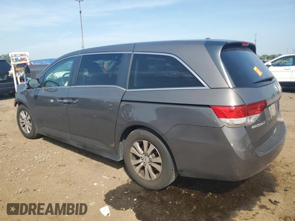 2014 Honda Odyssey EX-L with VIN 5FNRL5H61EB046093, listed as a Copart auction lot 61930335 with Not provided miles and Salvage title. Bid and sale history available at DreamBid. Image 2.