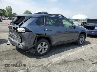 2024 Toyota RAV4 Hybrid LE with VIN JTMMWRFV7RD233242, listed as a Copart auction lot 60878815 with 11,064 mi miles and Salvage title. Bid and sale history available at DreamBid. Image 3.