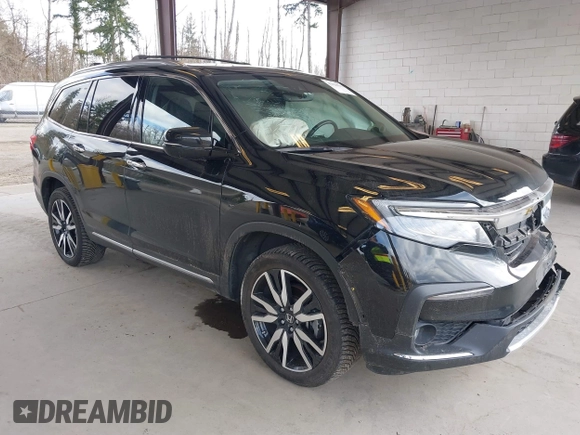 2021 Honda Pilot Elite with VIN 5FNYF6H04MB043014, listed as a IAAI auction lot 41826931 with 63,546 mi miles and . Bid and sale history available at DreamBid. Image 1.