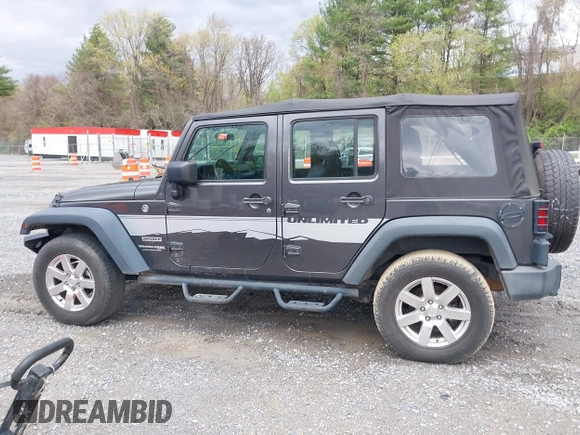 2018 Jeep Wrangler JK Unlimited Sport S with VIN 1C4BJWDG8JL895981, listed as a IAAI auction lot 42048316 with 95,457 mi miles. Bid and sale history available at carsss.com. Image 13.