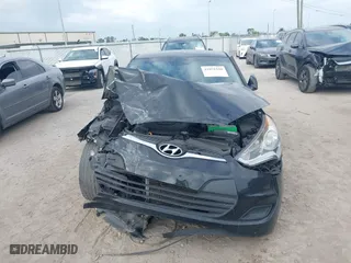 2016 Hyundai Veloster with VIN KMHTC6AD6GU251094, listed as a IAAI auction lot 41971550 with 97,744 mi miles. Bid and sale history available at carsss.com. Image 12.