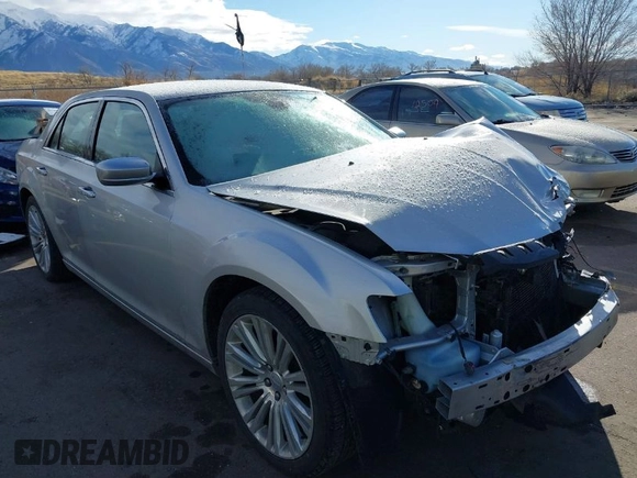 2012 Chrysler 300 C Luxury Series with VIN 2C3CCAPT9CH229047, listed as a IAAI auction lot 41219651 with 79,184 mi miles and . Bid and sale history available at carsss.com. Image 1.