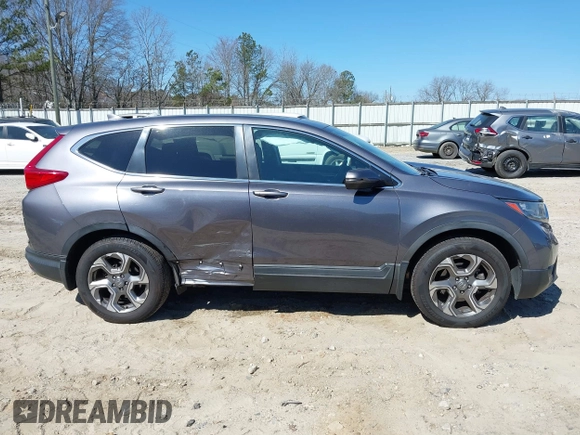 2019 Honda CR-V EX with VIN 5J6RW1H5XKL005682, listed as a IAAI auction lot 41663175 with 91,367 mi miles. Bid and sale history available at carsss.com. Image 13.