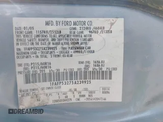 2005 Ford Taurus SE with VIN 1FAFP53275A239925, listed as a IAAI auction lot 42293953 with Not provided miles and . Bid and sale history available at DreamBid. Image 9.