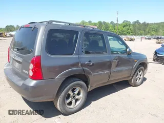 2005 Mazda Tribute S with VIN 4F2YZ04125KM04568, listed as a IAAI auction lot 41973671 with 244,117 mi miles and . Bid and sale history available at carsss.com. Image 6.