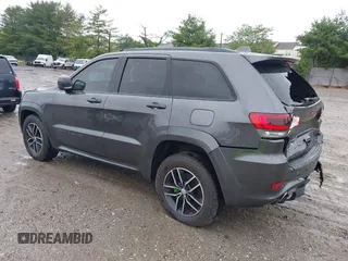 2017 Jeep Grand Cherokee Trailhawk with VIN 1C4RJFLG2HC645209, listed as a IAAI auction lot 42348470 with 170,905 mi miles and . Bid and sale history available at DreamBid. Image 3.