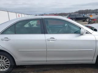 2009 Toyota Camry LE with VIN 4T1BK46K39U581157, listed as a IAAI auction lot 41827143 with 107,664 mi miles. Bid and sale history available at carsss.com. Image 14.