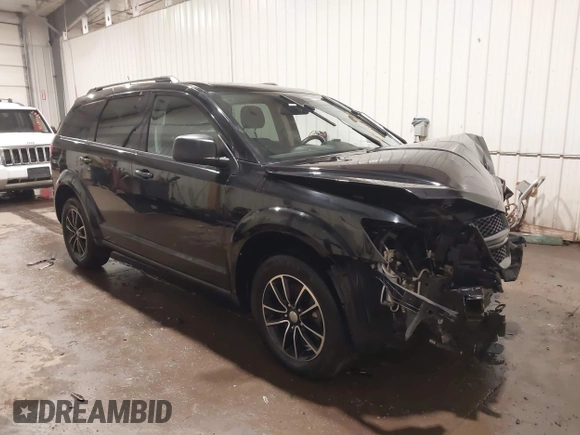 2017 Dodge Journey SE z VIN 3C4PDCAB4HT695490, wystawiony jako IAAI lot #41301719 z przebiegiem 103 642 mil mil oraz . Historia ofert i sprzedaży dostępna na DreamBid. Obrazek 1.