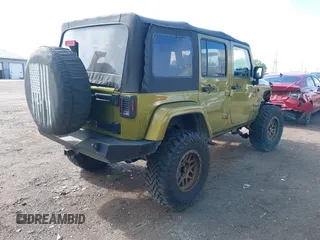 2008 Jeep Wrangler Unlimited Sahara with VIN 1J4GA59148L545255, listed as a IAAI auction lot 42177758 with 155,953 mi miles and . Bid and sale history available at DreamBid. Image 4.