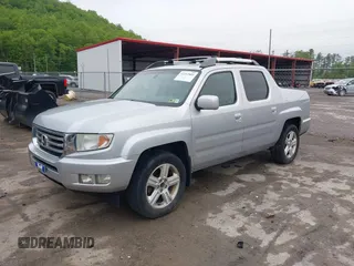 2012 Honda Ridgeline RTL with VIN 5FPYK1F58CB454385, listed as a IAAI auction lot 42212805 with 207,874 mi miles and . Bid and sale history available at DreamBid. Image 2.