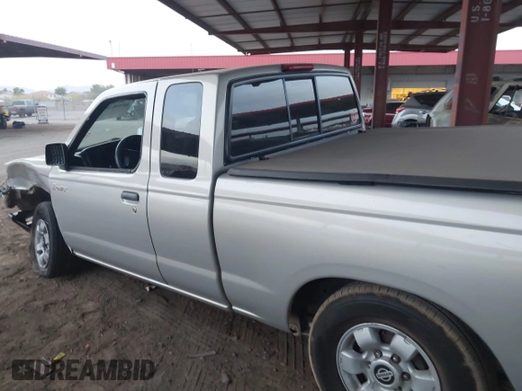 1999 Nissan Frontier XE z VIN 1N6DD26S3XC340419, wystawiony jako IAAI lot #40964630 z przebiegiem 156 431 mil mil oraz . Historia ofert i sprzedaży dostępna na DreamBid. Obrazek 14.