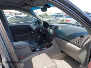2004 Acura MDX Touring Pkg w/Navigation with VIN 2HNYD18834H517618, listed as a IAAI auction lot 42003807 with 186,555 mi miles. Bid and sale history available at carsss.com. Image 5.