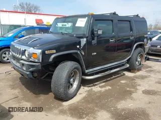 2007 Hummer H2 SUV z VIN 5GRGN23UX7H112972, wystawiony jako IAAI lot #41980625 z przebiegiem 214 857 mil mil oraz . Historia ofert i sprzedaży dostępna na DreamBid. Obrazek 18.