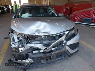 2023 Toyota Camry SE z VIN 4T1G11BK4PU093457, wystawiony jako IAAI lot #42061933 z przebiegiem 21 275 mil mil oraz . Historia ofert i sprzedaży dostępna na DreamBid. Obrazek 6.