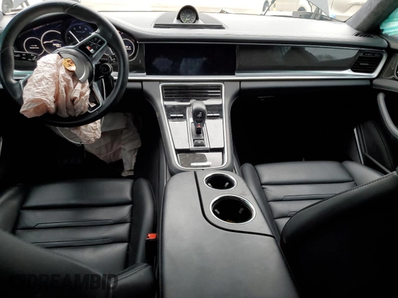 2018 Porsche Panamera с VIN WP0AH2A77JL145377, выставлен на аукционе Copart как лот 69142762 с пробегом 85 379 миль миль и . История ставок и продаж доступна на DreamBid. Изображение 8.