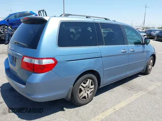 2005 Honda Odyssey EX-L with VIN 5FNRL38785B110823, listed as a IAAI auction lot 42154177 with 195,298 mi miles. Bid and sale history available at carsss.com. Image 4.