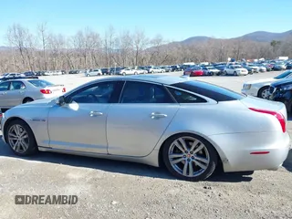 2014 Jaguar XJ z VIN SAJWJ1CD0E8V63989, wystawiony jako IAAI lot #41643513 z przebiegiem 119 924 mil mil oraz . Historia ofert i sprzedaży dostępna na DreamBid. Obrazek 17.