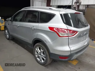 2015 Ford Escape Titanium with VIN 1FMCU0J96FUB81598, listed as a IAAI auction lot 41872114 with 122,001 mi miles and . Bid and sale history available at DreamBid. Image 3.