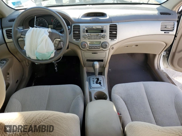 2007 Kia Optima EX with VIN KNAGE124475134560, listed as a Copart auction lot 85564384 with 106,233 mi miles and Salvage Title. Bid and sale history available at carsss.com. Image 8.