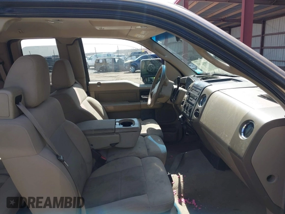 2005 Ford F-150 XLT with VIN 1FTPX14525NA78019, listed as a IAAI auction lot 41932381 with 170,153 mi miles. Bid and sale history available at carsss.com. Image 5.