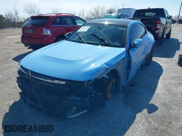 2023 BMW M2 z VIN 3MF13DM00P8D18677, wystawiony jako IAAI lot #41835134 z przebiegiem Nie podano mil oraz . Historia ofert i sprzedaży dostępna na DreamBid. Obrazek 21.