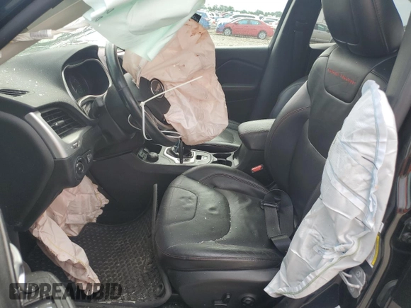 2014 Jeep Cherokee Trailhawk with VIN 1C4PJMBB2EW173458, listed as a Copart auction lot 56146355 with Not provided miles and Salvage title. Bid and sale history available at DreamBid. Image 7.