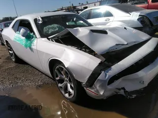 2016 Dodge Challenger SXT Plus z VIN 2C3CDZAG0GH254450, wystawiony jako IAAI lot #39708908 z przebiegiem Nie podano mil oraz . Historia ofert i sprzedaży dostępna na DreamBid. Obrazek 1.
