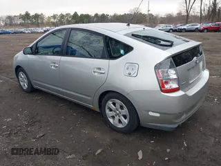 2005 Toyota Prius with VIN JTDKB20U853110933, listed as a IAAI auction lot 42049592 with 158,217 mi miles. Bid and sale history available at carsss.com. Image 3.