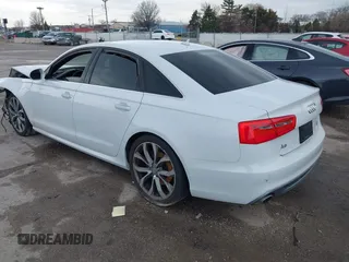 2014 Audi A6 Prestige z VIN WAUHMAFC6EN098487, wystawiony jako IAAI lot #41908034 z przebiegiem 146 298 mil mil oraz . Historia ofert i sprzedaży dostępna na DreamBid. Obrazek 3.