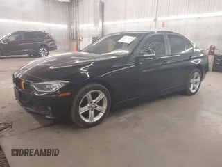 2014 BMW 3 Series 328i xDrive with VIN WBA3B3C5XEJ980450, listed as a IAAI auction lot 42078717 with 108,763 mi miles. Bid and sale history available at carsss.com. Image 2.