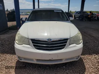 2007 Chrysler Sebring z VIN 1C3LC46K47N556611, wystawiony jako Copart lot #53664705 z przebiegiem 203 653 mil mil oraz Szkoda całkowita • Salvage title. Historia ofert i sprzedaży dostępna na DreamBid. Obrazek 5.