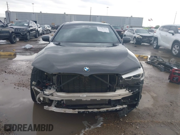 2020 BMW 5 Series 530i with VIN WBAJR3C08LWW77822, listed as a IAAI auction lot 41880376 with 52,533 mi miles and . Bid and sale history available at carsss.com. Image 13.