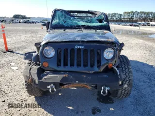 2012 Jeep Wrangler Sport with VIN 1C4AJWAG4CL227968, listed as a Copart auction lot 45925685 with 134,755 mi miles and Salvage title. Bid and sale history available at DreamBid. Image 5.