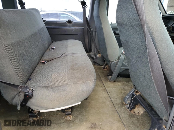 1995 Ford Econoline Wagon XL z VIN 1FBJS31H6SHB90674, wystawiony jako Copart lot #56070895 z przebiegiem 329 012 mil mil oraz Szkoda całkowita • Salvage title. Historia ofert i sprzedaży dostępna na DreamBid. Obrazek 11.
