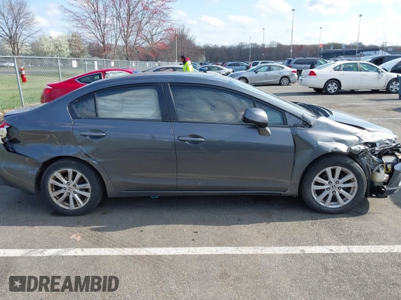2012 Honda Civic EX-L with VIN 2HGFB2F94CH307646, listed as a IAAI auction lot 42006923 with 260,917 mi miles and . Bid and sale history available at DreamBid. Image 13.