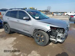 2021 Jeep Cherokee Altitude with VIN 1C4PJLLB6MD112830, listed as a IAAI auction lot 41560135 with 76,760 mi miles. Bid and sale history available at carsss.com. Image 1.