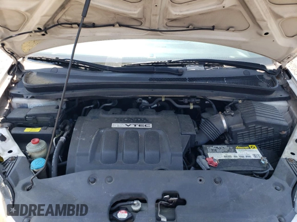 2007 Honda Odyssey LX with VIN 5FNRL38287B054504, listed as a Copart auction lot 59141665 with 128,617 mi miles and Salvage title. Bid and sale history available at DreamBid. Image 12.