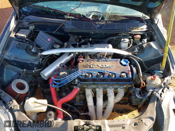1997 Honda Civic EX z VIN 1HGEJ8149VL078982, wystawiony jako IAAI lot #41525566 z przebiegiem 129 926 mil mil oraz . Historia ofert i sprzedaży dostępna na DreamBid. Obrazek 10.