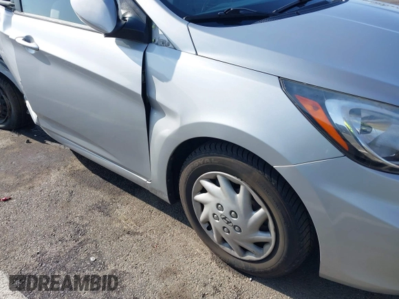 2013 Hyundai Accent GLS with VIN KMHCT4AE4DU477465, listed as a IAAI auction lot 41930256 with 48,877 mi miles and . Bid and sale history available at carsss.com. Image 21.