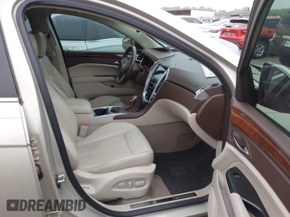 2016 Cadillac SRX Luxury Collection z VIN 3GYFNBE35GS566047, wystawiony jako IAAI lot #42201964 z przebiegiem 72 887 mil mil oraz . Historia ofert i sprzedaży dostępna na DreamBid. Obrazek 5.