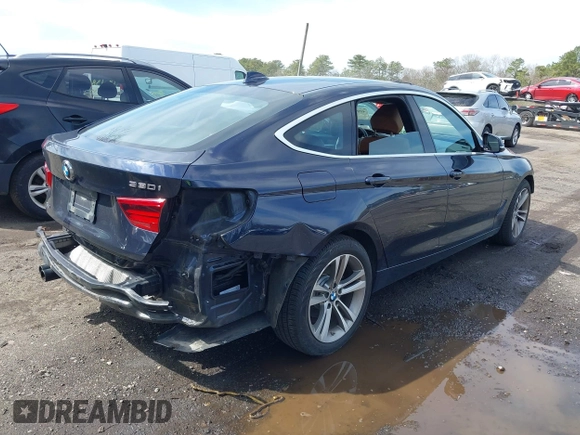 2018 BMW 3 Series 330i xDrive with VIN WBA8Z9C54JG828207, listed as a IAAI auction lot 42000931 with 73,736 mi miles. Bid and sale history available at carsss.com. Image 4.