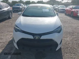 2019 Toyota Corolla L with VIN 2T1BURHE0KC179280, listed as a IAAI auction lot 41944624 with 102,964 mi miles. Bid and sale history available at carsss.com. Image 13.
