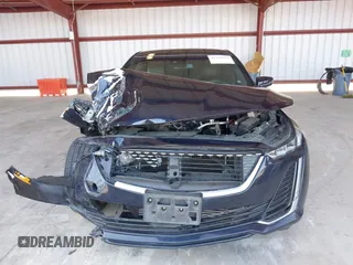 2020 Cadillac CT5 Luxury z VIN 1G6DM5RK2L0117741, wystawiony jako IAAI lot #42369222 z przebiegiem 206 105 mil mil oraz . Historia ofert i sprzedaży dostępna na DreamBid. Obrazek 12.