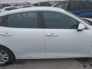 2016 Kia Optima LX with VIN KNAGT4L39G5104726, listed as a IAAI auction lot 40950914 with 128,728 mi miles. Bid and sale history available at carsss.com. Image 13.