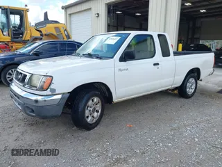 2000 Nissan Frontier XE with VIN 1N6DD26S9YC363558, listed as a IAAI auction lot 42016497 with 243,221 mi miles and . Bid and sale history available at DreamBid. Image 2.