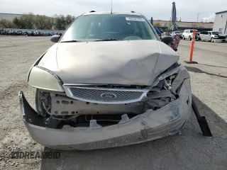 2005 Ford Focus SE with VIN 1FAHP36N65W153155, listed as a Copart auction lot 49356705 with 103,907 mi miles and Salvage Title. Bid and sale history available at carsss.com. Image 5.