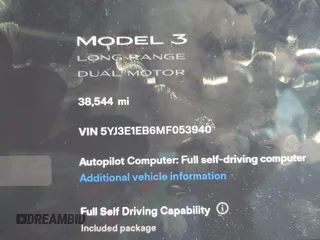 2021 Tesla Model 3 Long Range with VIN 5YJ3E1EB6MF053940, listed as a IAAI auction lot 41344978 with 38,544 mi miles and . Bid and sale history available at DreamBid. Image 7.