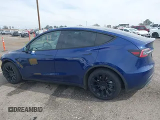 2021 Tesla Model Y Long Range with VIN 5YJYGAEE5MF199286, listed as a IAAI auction lot 41677915 with 52,500 mi miles. Bid and sale history available at carsss.com. Image 15.