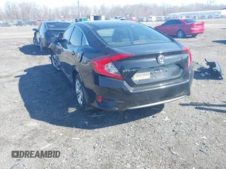 2018 Honda Civic LX with VIN 19XFC2F58JE042456, listed as a IAAI auction lot 41823195 with 45,291 mi miles and . Bid and sale history available at DreamBid. Image 3.
