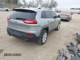2014 Jeep Cherokee Latitude with VIN 1C4PJMCS7EW220899, listed as a IAAI auction lot 41973561 with 135,572 mi miles. Bid and sale history available at carsss.com. Image 4.
